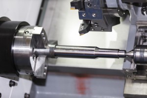 Operator machining mold and die part for automotive industrial